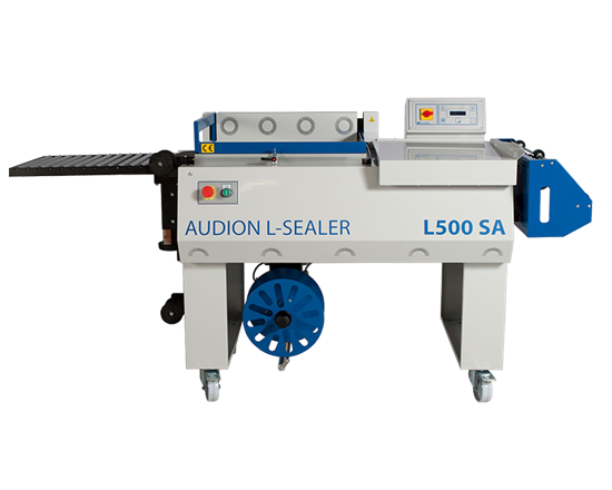 Audion L 500SA - Deze semi automatische L-sealer wordt gebruikt om uw producten op een snelle, veilige en aantrekkelijke wijze te verpakken. Vaak toegepast in combinatie met een TE-Matic krimptunnel. Vergeleken met de conventionele L-sealers, genereert de L-serie van Audion een hogere output en consistent sterkere seals. Kan voor zowel Polyethylene als voor Polyolefine centrefold folie gebruikt worden.